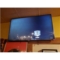 50" LG TELEVISION WITH WALL MOUNT COMES WITH REMOTE