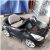 Image 1 : Black 12v ride on car no charger