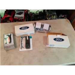 2 NEW FORD CLOCKS, SWISS FORCE DETOUR VEHICLE ESCAPE TOOL AND READING GLASSES