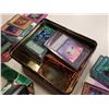 Image 8 : 2 TINS OF YU GI OH AND BOX OF POKEMON CARDS