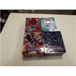 4 TINS OF YU GI OH CARDS