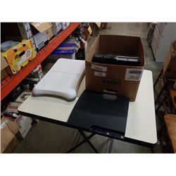 Two boxes of PlayStation 3 wii fit board and box of dvds and games