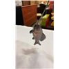 Image 3 : METAL FISHING FIGURE AND 3 BRASS TONE CANDLE HOLDERS