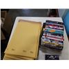 Image 5 : BUBLE ENVELOPES, DVDS AND MASTER LOCK COMBINATION LOCKS