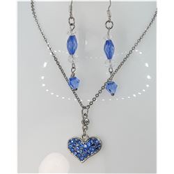 14)  PALE BLUE CRYSTAL HEART ON 16" SILVER