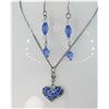 Image 1 : 14)  PALE BLUE CRYSTAL HEART ON 16" SILVER