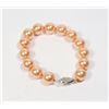 Image 1 : #34-ORANGE SEA SHELL PEARL BRACELET 12mm/7.5"