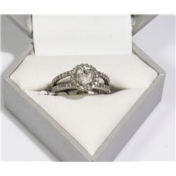 42) 14KT WHITE GOLD DIAMOND RING. SIZE 7