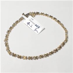 12) 10KT YELLOW AND WHITE GOLD DIAMOND BRACELET