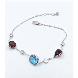 White Gold & Blue Topaz,Garnet & White Sapphire Bracelet