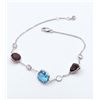 Image 1 : White Gold & Blue Topaz,Garnet & White Sapphire Bracelet