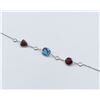 Image 2 : White Gold & Blue Topaz,Garnet & White Sapphire Bracelet