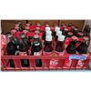 Image 2 : Collection of 6 and 4 bottle crates with Alberto del Olympics collectible Coca Cola bottle