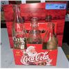 Image 2 : Collectible glasses with Coca Cola bottles and holder