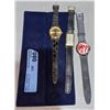 Image 1 : 3 Coca-Cola watches.2 gold-plated vintage style and 1 red faced with rubber strap