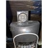 Image 2 : Two standing heaters with remote controllers