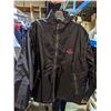 Image 8 : A rack full of sports wears jackets, jackets and other clothing