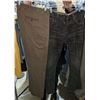 Image 1 : Rack full of jeans or dress pants approx. 60 items