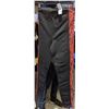 Image 4 : Rack full of women pants and tank tops
