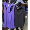 Image 6 : Rack full of women pants and tank tops