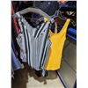Image 7 : Rack full of women pants and tank tops