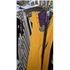 Image 9 : Rack full of women pants and tank tops