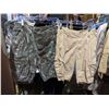 Image 11 : Rack full of men's clothing from the show