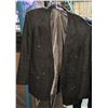 Image 1 : Rack full of broken down pants and zombie jackets