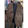Image 2 : Rack full of broken down pants and zombie jackets