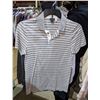 Image 1 : A rack full of men's shirts, T-shirts, and, polos