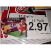 Image 2 : Coca Cola menu board with variety of promotional advertising and price tags