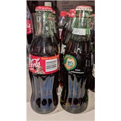12 collectible coke bottles (100 anniversary for Atlanta bull dogs limited production)