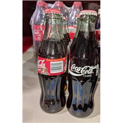 Various collectibles and early 1 litre Coca Cola bottle
