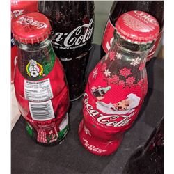 Wrap Christmas bottles with large vintage Coca Cola bottles