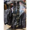 Image 2 : Leather top with leather and metal wrist bracelets and broken down skirt accessories - full outfit