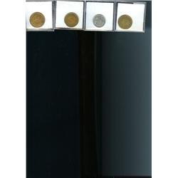 Lot of four merchant tokens.  Breton 58