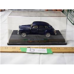 1941 Plymouth toy car in display case