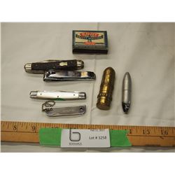 Lot of pocket knives and lighters