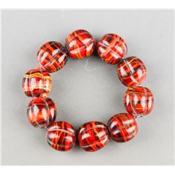 Chinese Fire Agate Carved Lobed Bead Bracelet