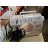Image 2 : SINGER SEWING MACHINE AND SEWING PATTERNS