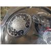 Image 2 : 2 BAGS OF SILVER BELT BUCKLES, BOLO TIES, BOOT BRACELET, HAT BANDS AND TSHIRT COLOR TIPS