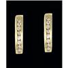 Image 1 : 10KY Gold 25ct. Channel Set Diamond Earrings