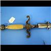 Image 1 : Sword Signed Sonnitzler Sword Signed Sonnitzler, ribbed bone handle, brass bow and arrow marked OKF 