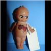 Image 1 : Celluloid Rose O'Neil Kewpie 3 1/2" Rose O'Neil Kewpie with Label.  Very good condition.