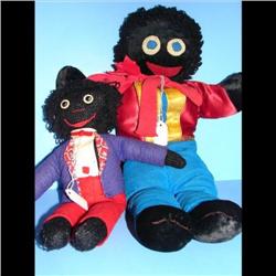 2 Golliwogs 2 Golliwogs  measuring 20  and 13  one with a red scarf and red & yellow shirt the other