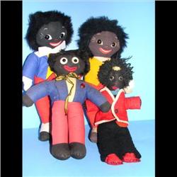 4 Early Golliwogs Group of four early golliwogs measuring 11", 12", and two at 13".  Very good condi