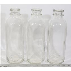 BOX OF VINTAGE MILK BOTTLES
