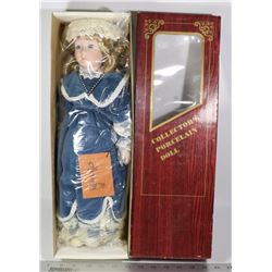 PORCELAIN DOLL. HEIRLOOM COLLECTION