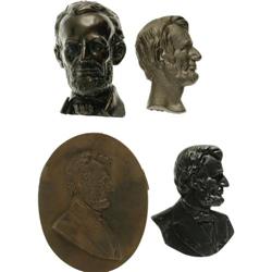 Collection of Four Lincoln Relief Wall-Hangings. 