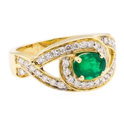 1.35 ctw Oval Mixed Emerald And Round Brilliant Cut Diamond Ring - 14KT Yellow G
